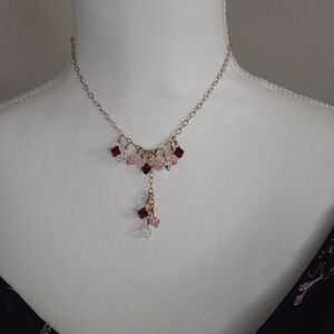Swarovski Red and Pink crystals with gold plated necklace.
